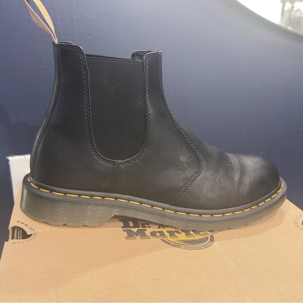 Dr. Martens Black and Yellow Logo on Kraft Box
